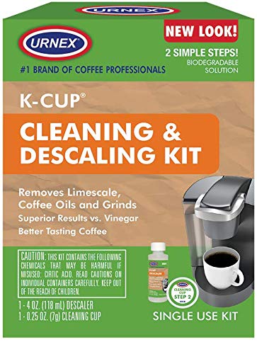 Urnex coffee descaling kit for Keurig coffee makers, shown with cleaning solution bottles and accessories.