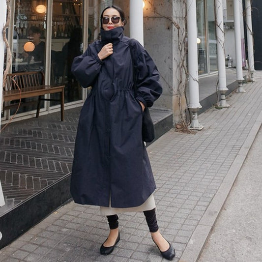 Navy blue mid-length loose windbreaker jacket for women by BACKUPMYFILESNOW.COM®. Thin, lightweight, casual outerwear.