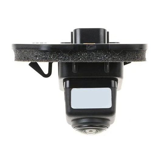 Backup rear view camera for Nissan X-Trail 2013-2017, showing the lens and mounting bracket for reversing park assist.