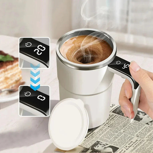 Pink automatic self-stirring magnetic mug with LCD screen, stainless steel, USB rechargeable, perfect for coffee or milk mixing.