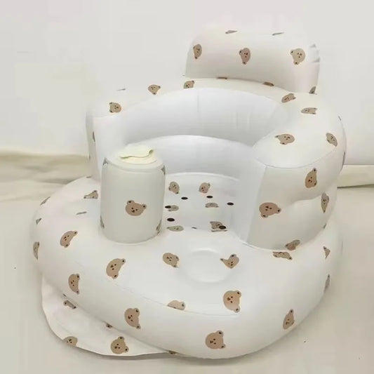 Inflatable baby chair for dining and bath, rainbow-colored, designed for safe and comfortable seating for infants.