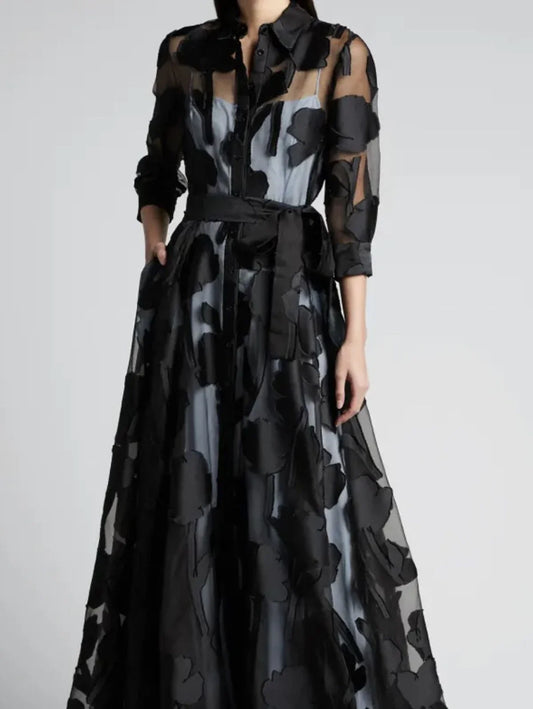 Elegant black women's maxi dress with three-quarter sleeves, knotted waist, jacquard mesh fabric, transparent design for club or party wear