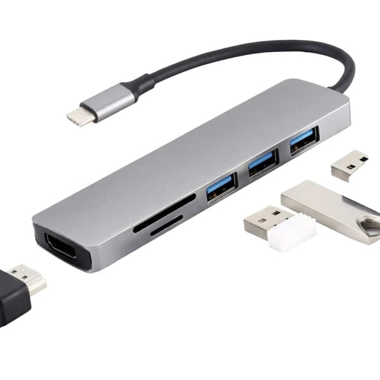 Silver USB 3.0 aluminum alloy car hub expansion dock connected to a laptop, showcasing multiple USB ports for laptop and PC use.