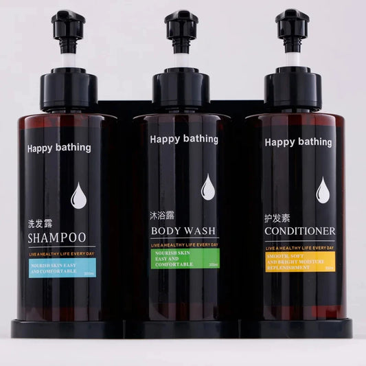 Wall-mounted hotel shampoo and shower gel bottles with hand sanitizer boxes and manual soap dispensers, no punching required.