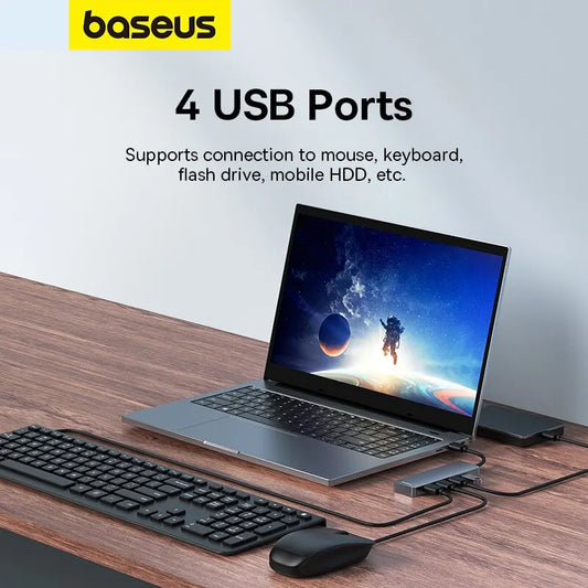Baseus 4-port USB 3.0 hub in grey, connected to a laptop, showing multiple USB devices attached for expanded connectivity.
