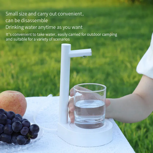 White BACKUPMYFILESNOW.COM® automatic pumping water dispenser with sleek design and easy-to-use tap for convenient water access.