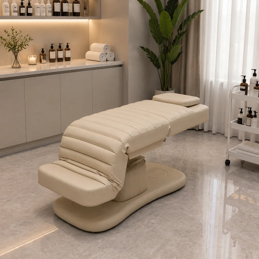 White electric beauty bed with PU leather surface, ergonomic design, easy to clean, ideal for beauty salons and spa massage treatments.