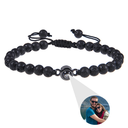 White turquoise custom photo projection bracelet from BackupMyFilesNow.com featuring text in 100 languages.