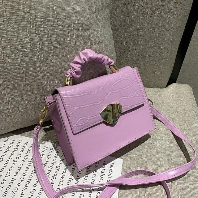 BACKUPMYFILESNOW® women's designer crossbody handbag with stone pattern, featuring a compact shape and stylish design.
