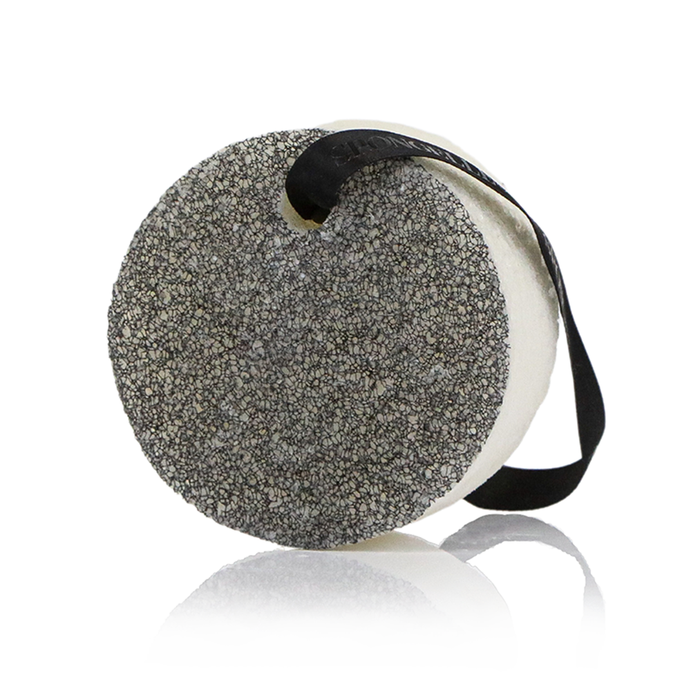 Black Spongellé Men's Ultimate Buffer body wash infused scrubber for exfoliating and cleansing the skin.