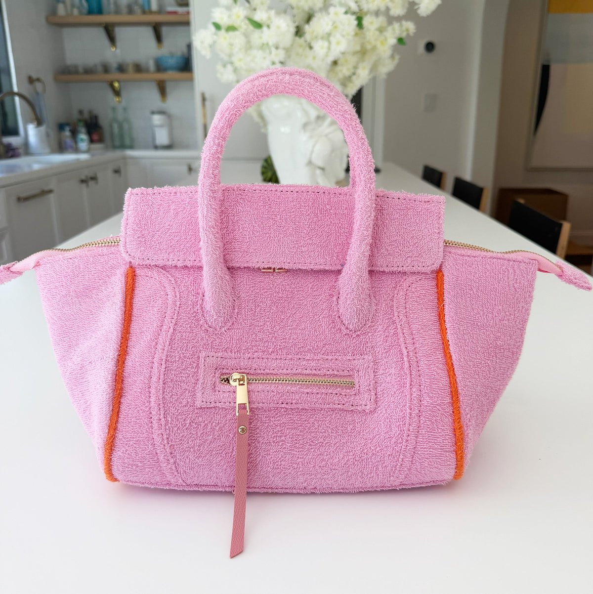Beach Haus Cabana Tote Mini in Bubblegum color, showing the small pink woven tote bag with handles and textured design.