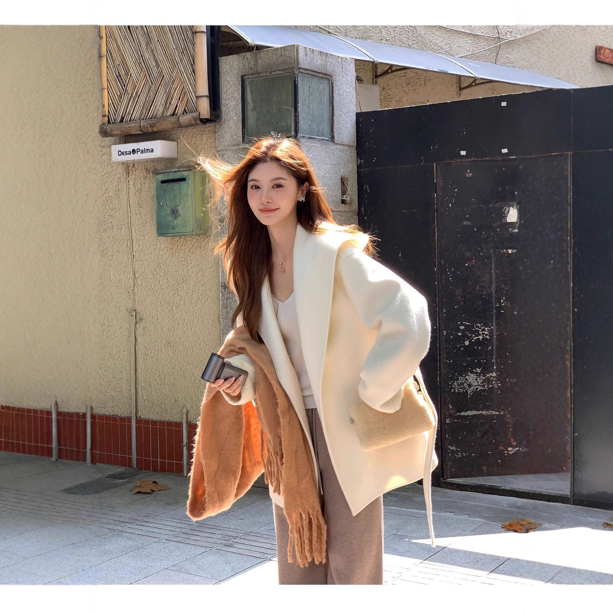 Women's sophisticated double-faced wool coat in classic tailored silhouette