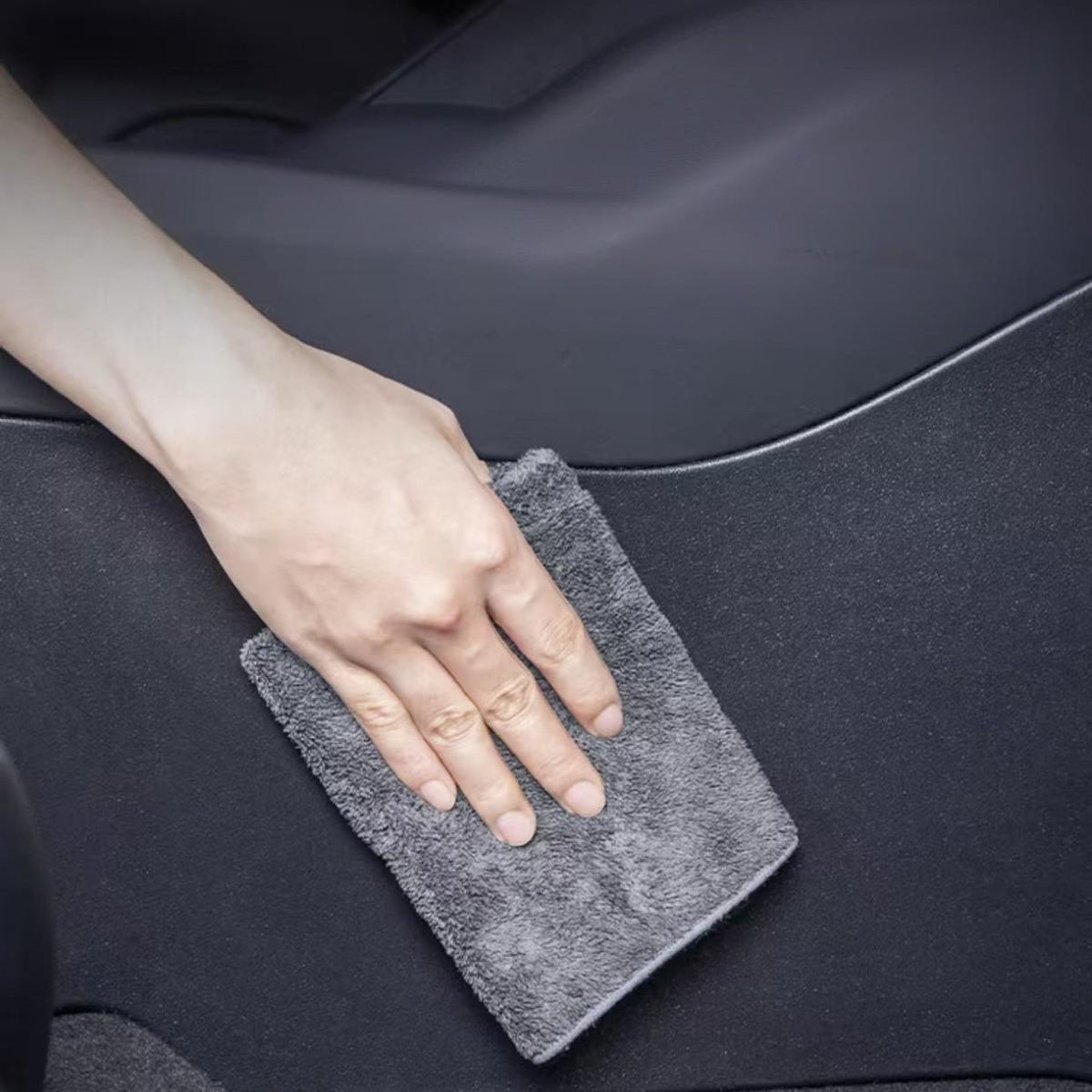 Pair of Tesery Model Y Juniper center console side anti-kick mats, protective covers for left-hand drive interior.