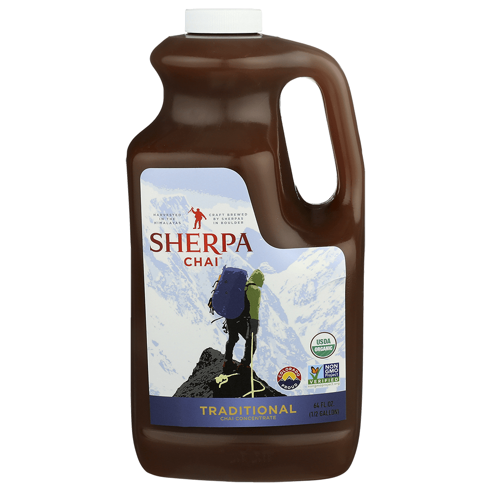 Bottle of Sherpa Chai Chai Concentrate by Nepal Tea, showcasing the beverage in a clear container with a label and cap.