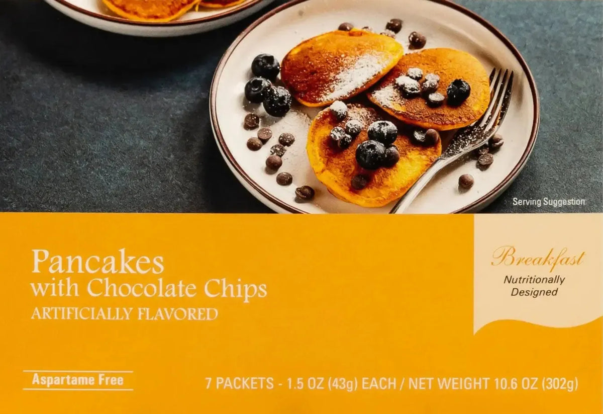 Box of AmBari Nutrition chocolate chip pancake mix with packaged pancake products visible.