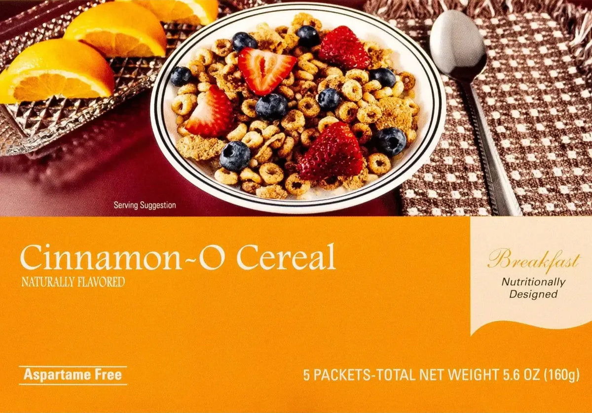 AmBari Nutrition Cinnamon-O cereal box with a bowl of cereal and cinnamon sticks, showcasing the packaged cinnamon-flavored breakfast food.