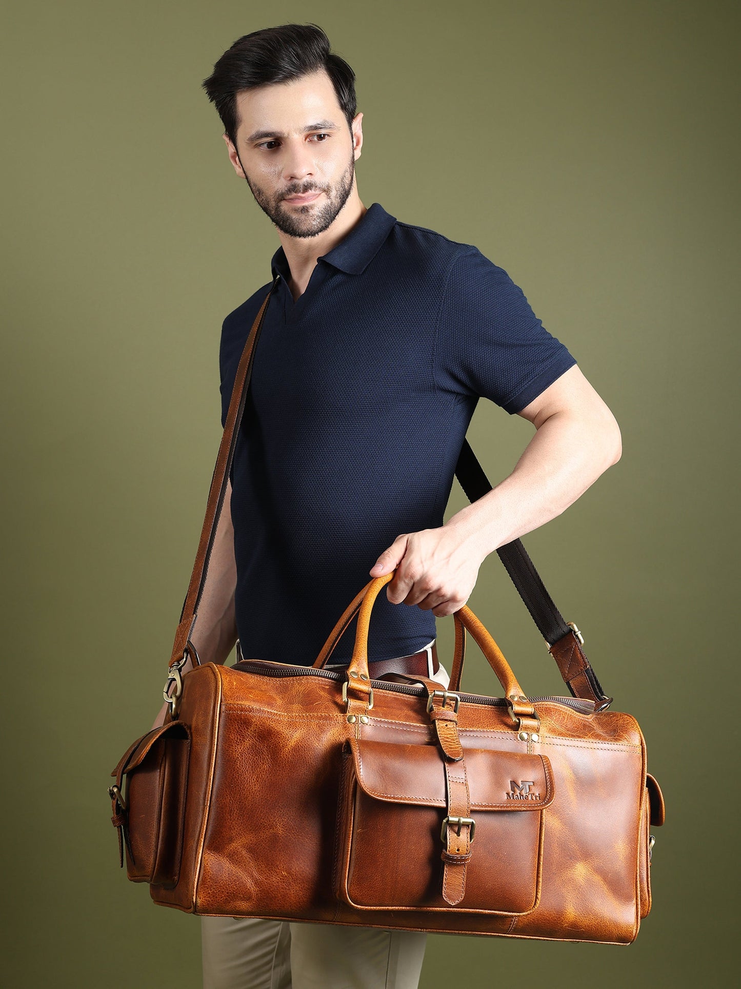 Classy Leather Bags Berlin Leather Weekender Duffle Bag in black, 20-inch travel bag with sturdy leather construction and handles.