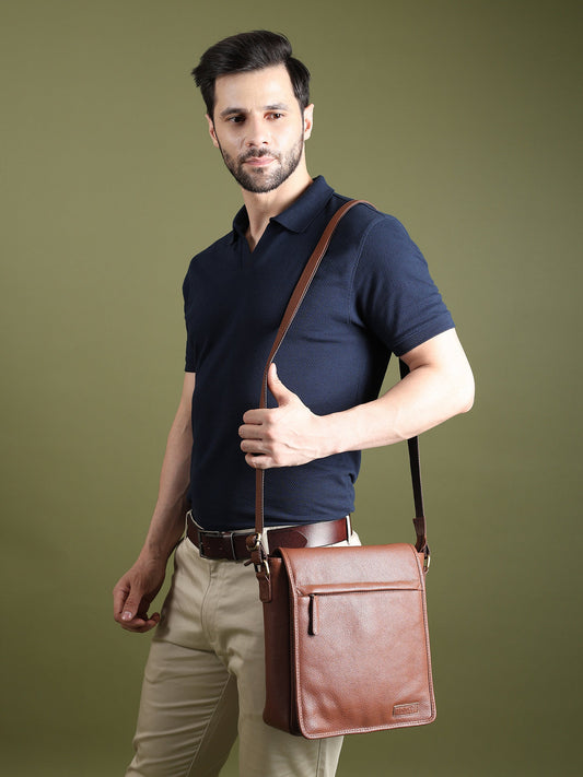Leather crossbody messenger bag from Classy Leather Bags, designed for travel and work, with adjustable strap and multiple compartments.