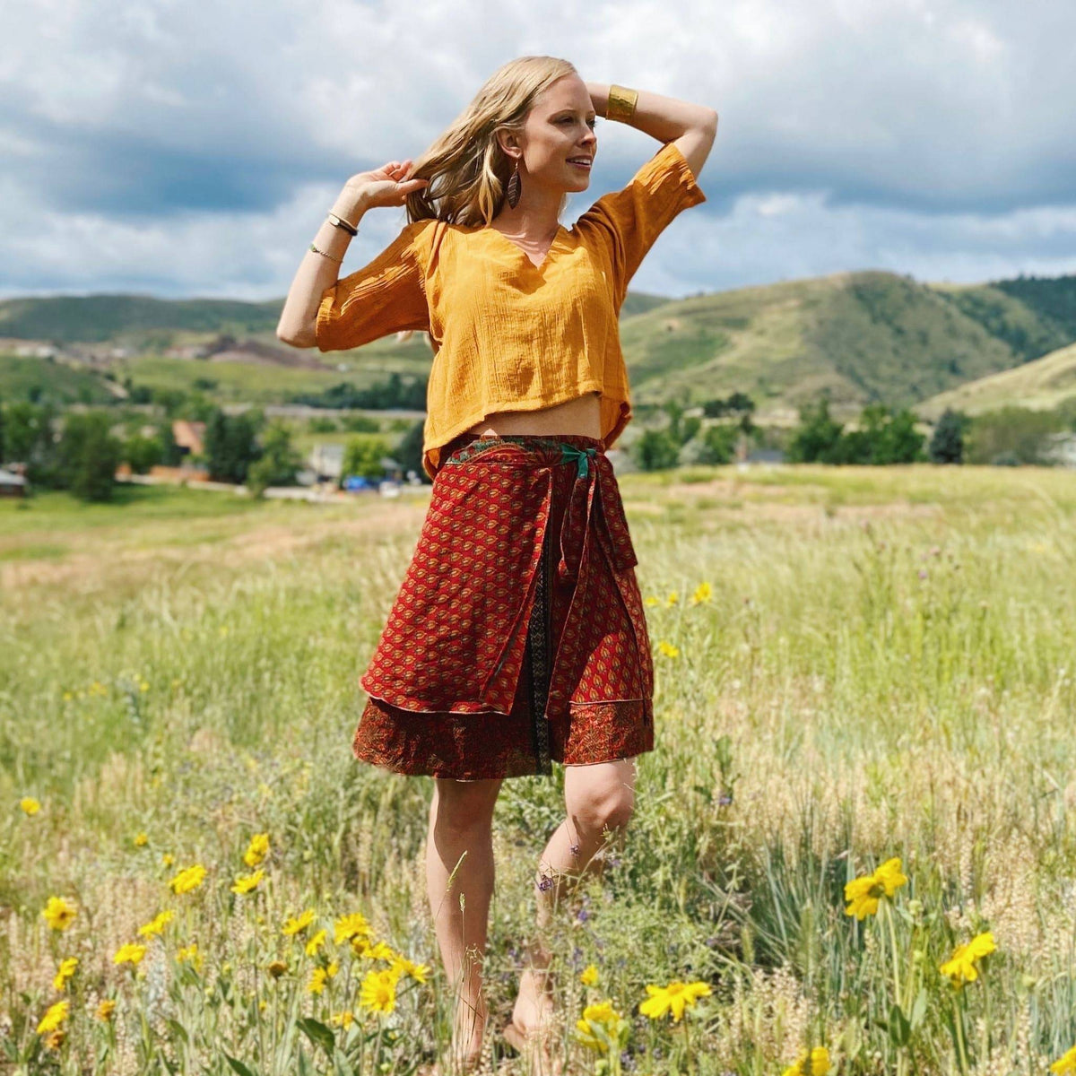 Darn Good Yarn Made With Love sari wrap skirt in warm tones, showcasing its flowing fabric and stylish design.