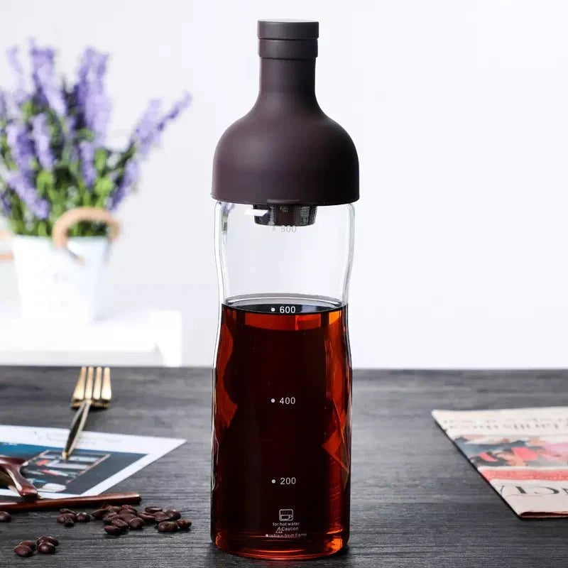 Nepal Tea Cold Brew Infuser Bottle with stainless steel infuser for easy cold brewing of tea or beverages.