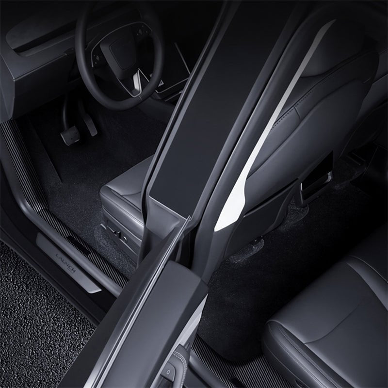 Tesla Model Y Juniper interior door sill protector kit by Tesery, showing the complete protective strip installed inside the vehicle.