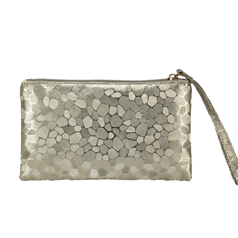 Black women's clutch bag and wallet from BACKUPMYFILESNOW® with gold accents, compact and stylish for evening use.