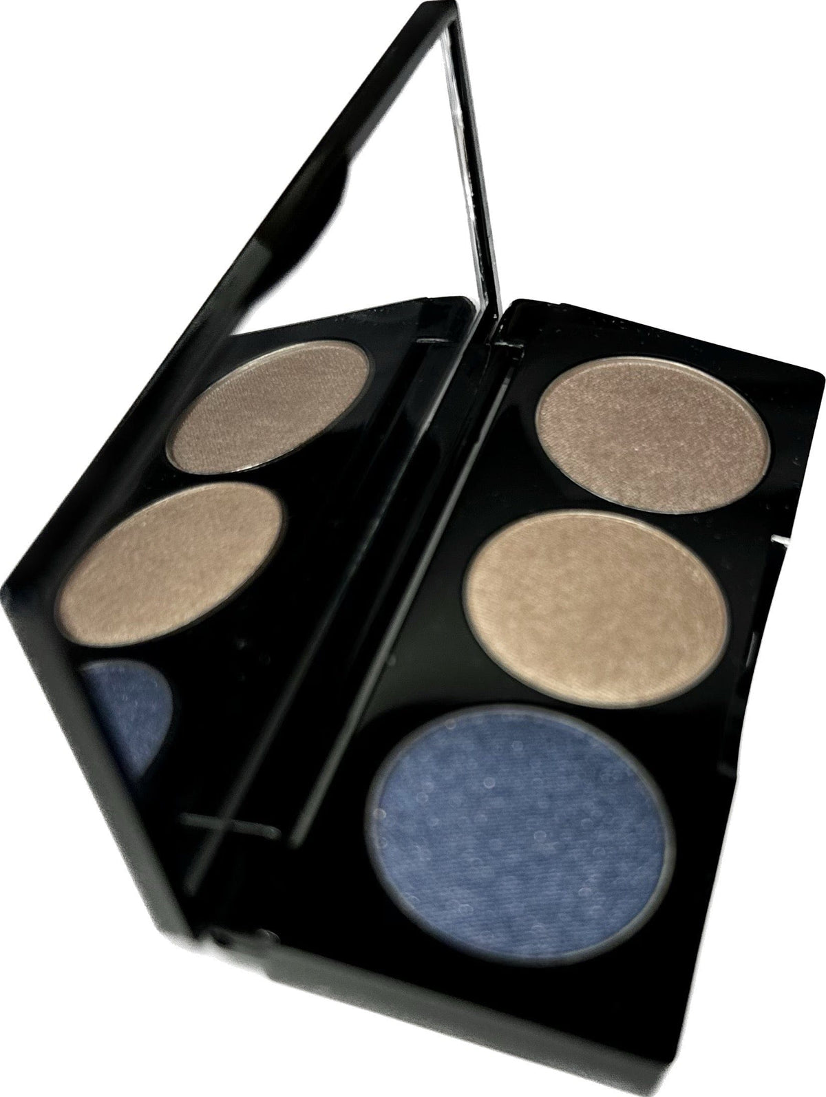 Danyel Cosmetics Nautical Chic Eyeshadow Trio Palette with three complementary eye shadow shades on a neutral background.