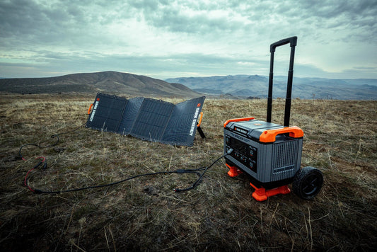 Dark Energy Recon 2000 Power Station with multiple charging ports and digital display, portable and suitable for outdoor power needs.