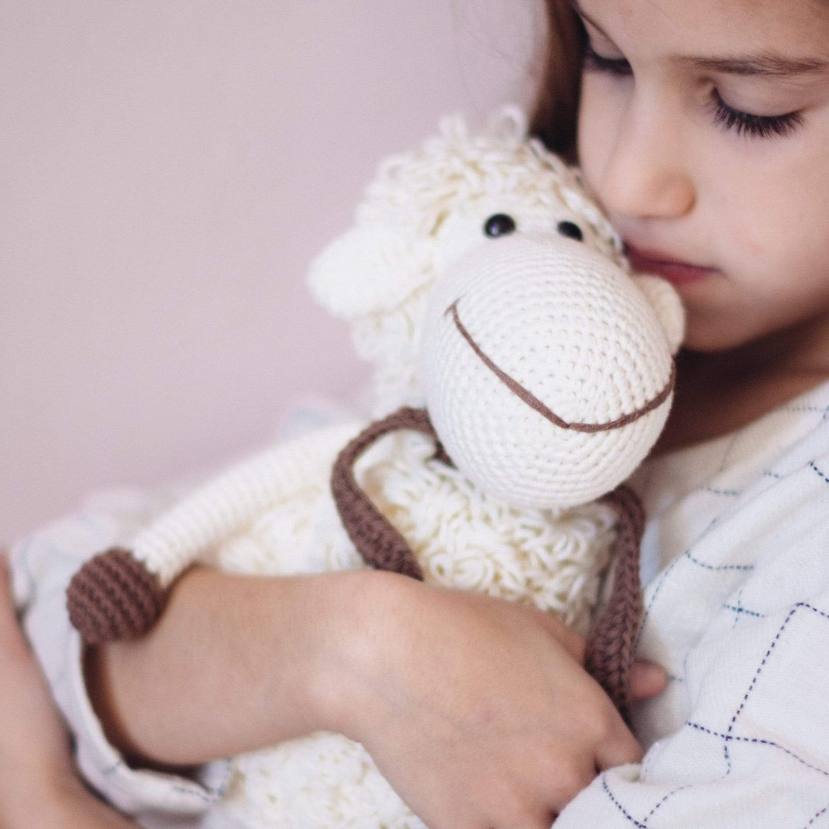 White Darla the sheep stuffed animal by Bebemoss, handmade organic cotton plush toy with soft, cuddly features.
