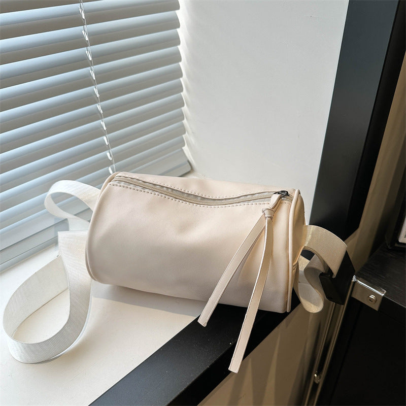 Simple fashion crossbody shoulder bag in a minimalist design, shown from the front
