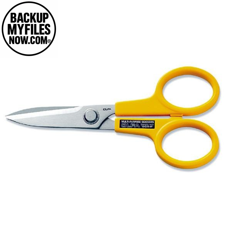 OLFA 7-inch stainless steel serrated scissors with sharp blades, ideal for cutting fabric, paper, and crafting materials.