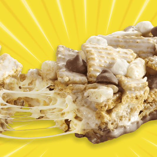 Golden Grahams S'mores cereal treat bars by General Mills with toasted cereal and marshmallow topping on a white background.