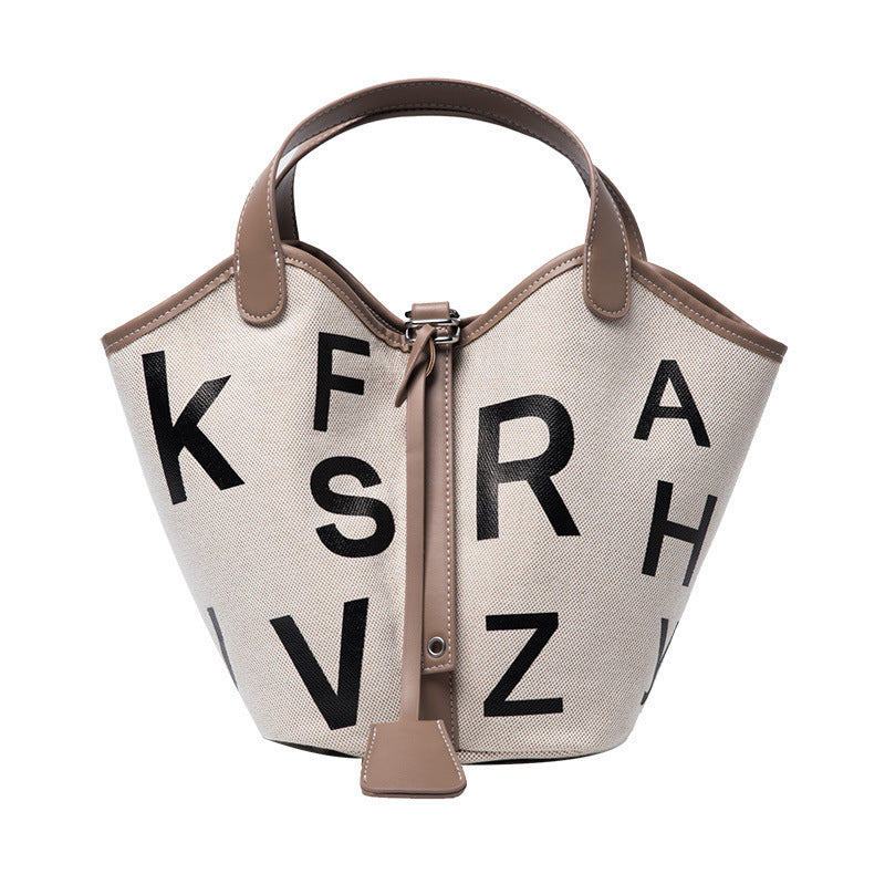 Women's letter printed canvas tote bag by BACKUPMYFILESNOW® featuring stylish design and spacious interior, perfect for daily use.
