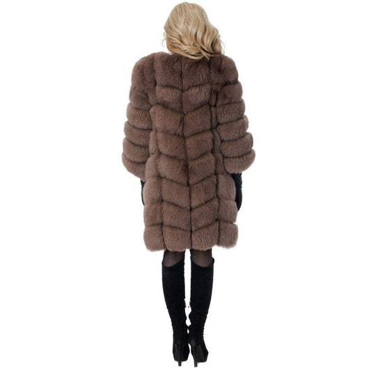 Thick warm fur coat for women in a classic design-vesm
