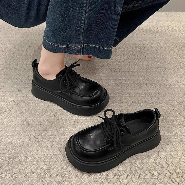 Black lace-up leather work shoes for comfortable commuting