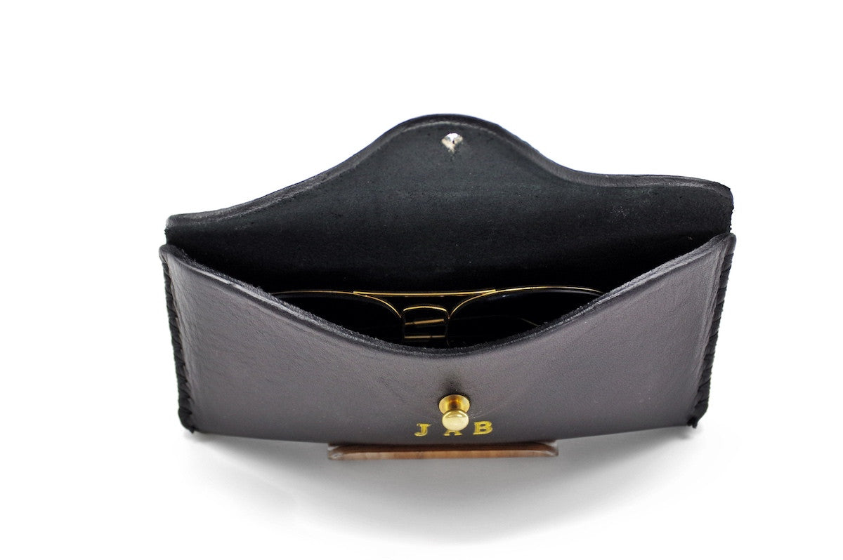 Bueno Leather Co. BLCO® handmade sunglasses case in brown leather with stitching detail, designed to protect sunglasses.