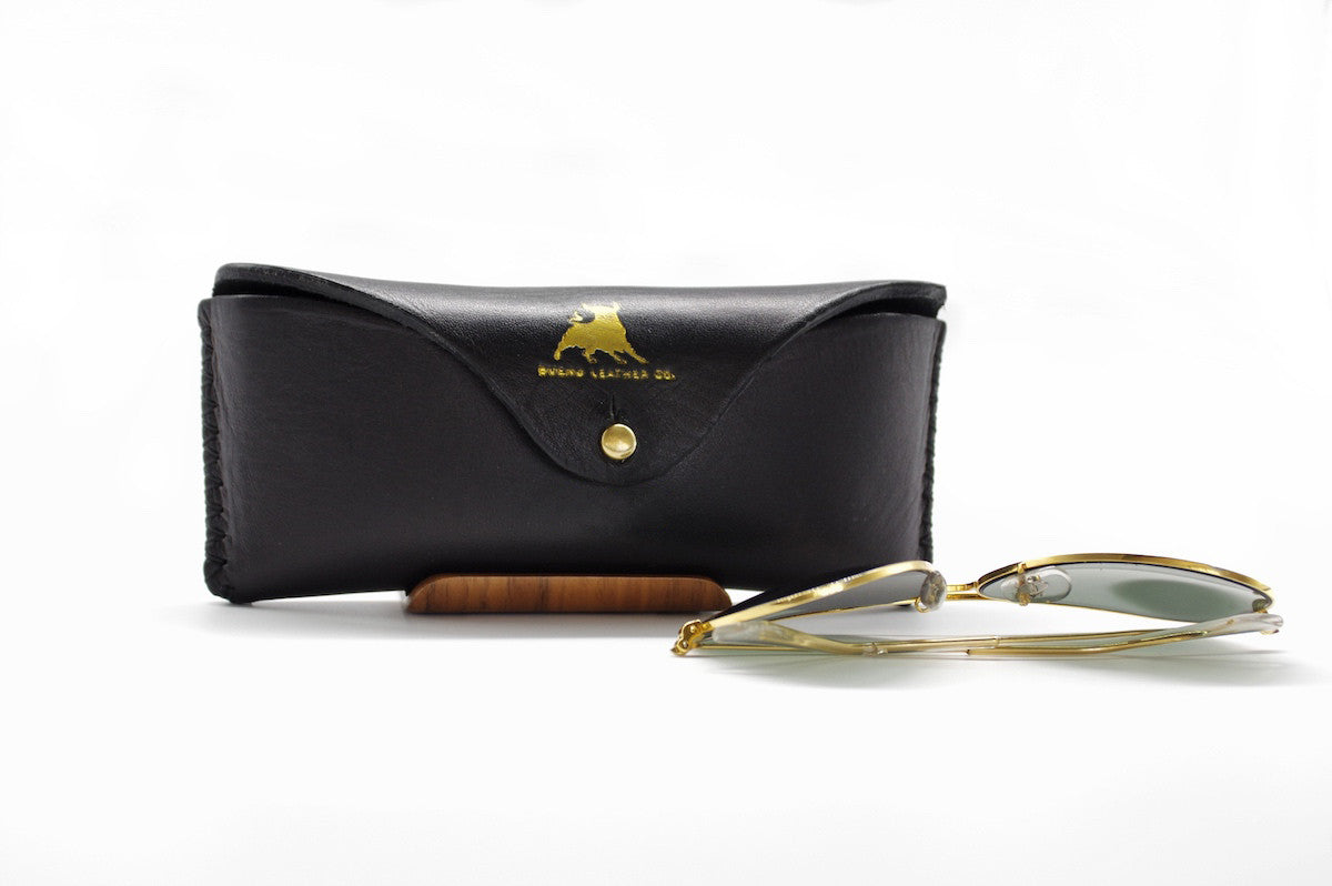 Bueno Leather Co. BLCO® handmade sunglasses case in brown leather with stitching, designed to protect and store sunglasses.