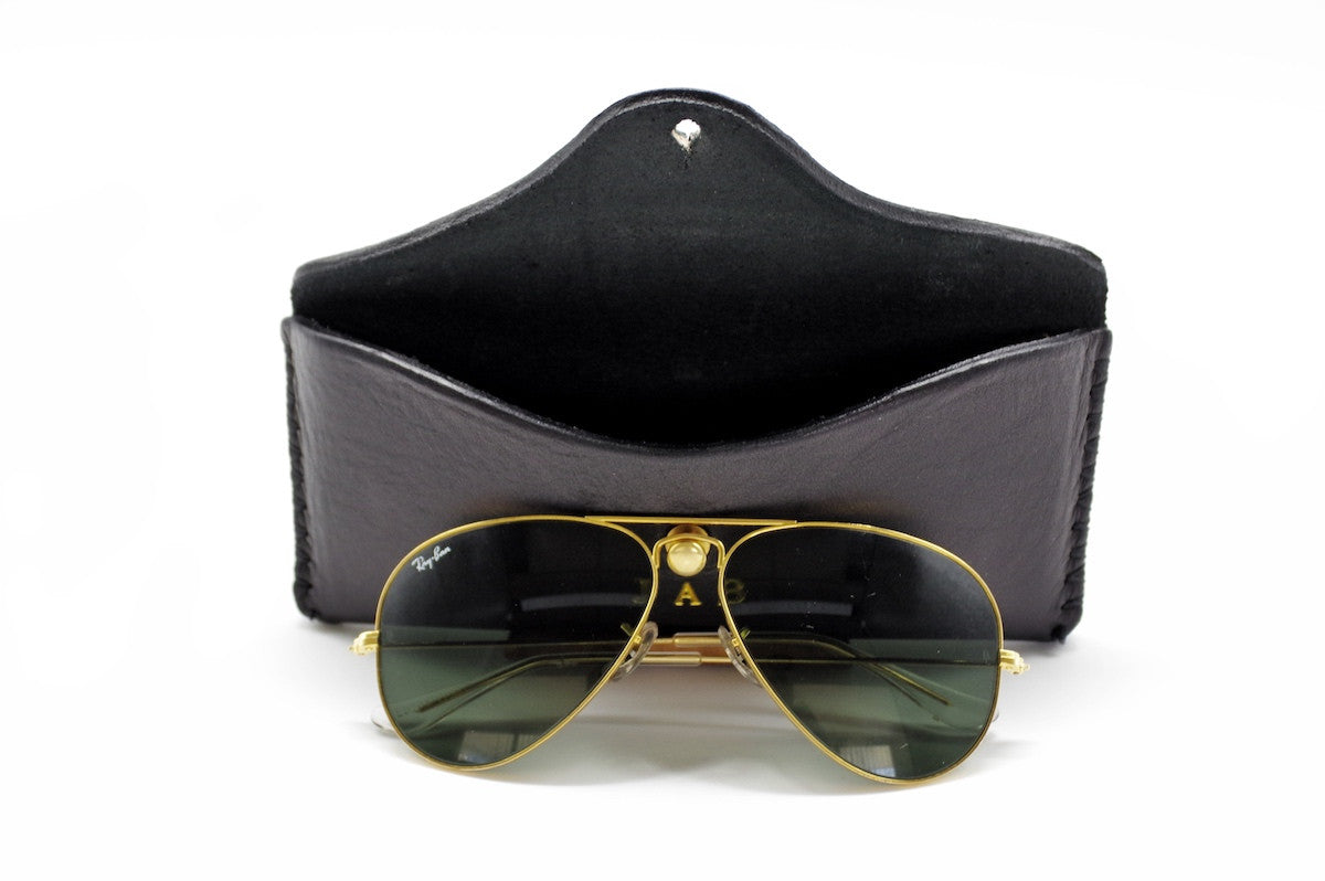 Bueno Leather Co. BLCO® handmade sunglasses case in brown leather with stitching, designed for storing and protecting sunglasses.