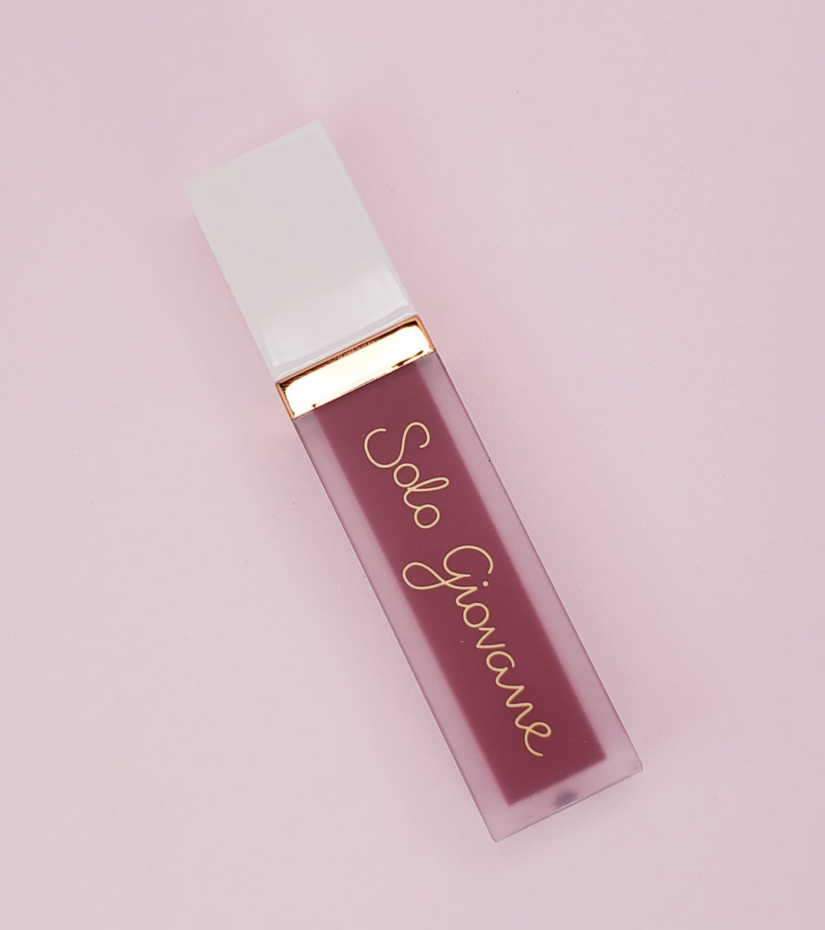 SG Matte Lipstick 020 by BACKUPMYFILESNOW® showing the sleek black tube and open cap revealing the matte lipstick shade.