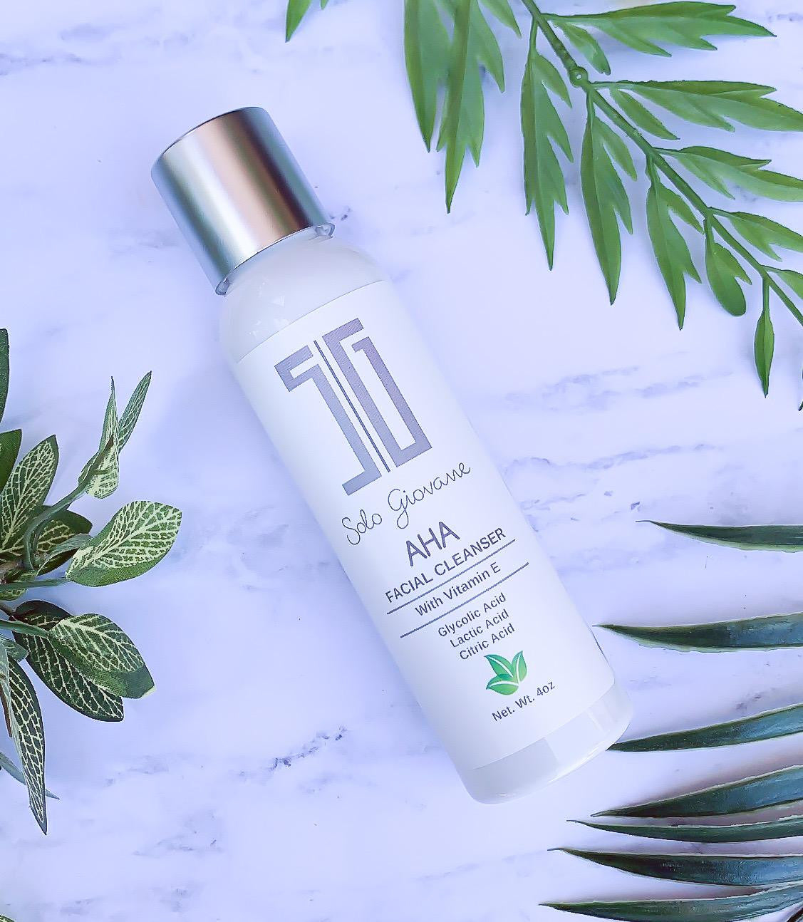 AHA Face Cleanser from BACKUPMYFILESNOW® in a clear pump bottle, showing its gentle formula for exfoliating and cleansing skin.