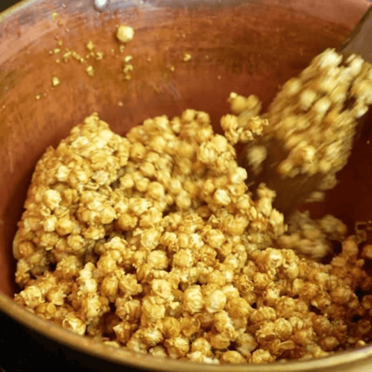 Fisher's Popcorn caramel popcorn tub, 1.2 gallons, large popcorn tub with Fisher's Popcorn branding and caramel popcorn inside