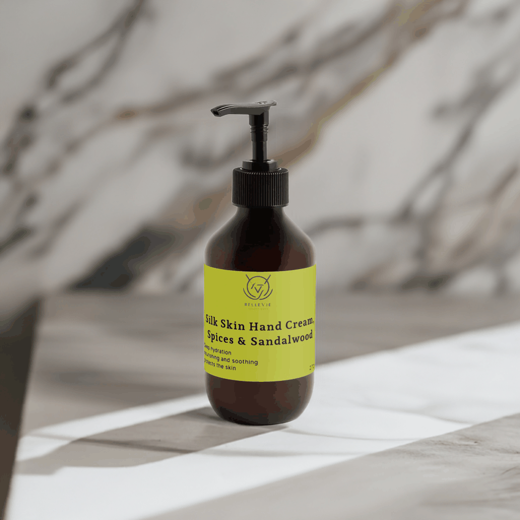 BelleVie Cosmétiques Silk Skin Hand Cream with spices and sandalwood, showing a creamy hand cream texture in a 270ml container.