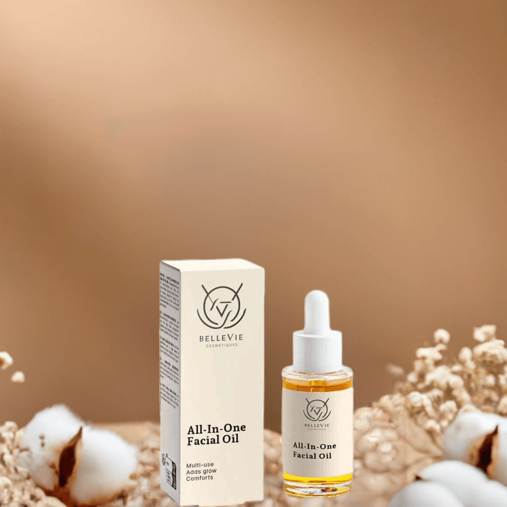 BelleVie Cosmétiques anti-aging facial oil 30ml with dropper, showing a clear glass bottle and golden facial oil inside.