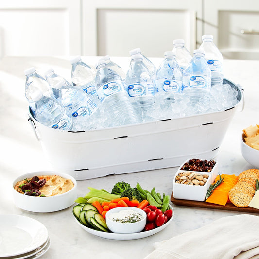 Forty 16.9 fl oz bottles of Great Value Purified Drinking Water in a pack, clear plastic bottles with blue caps.