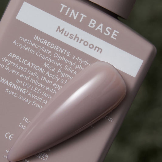 HeyLove Tint Base Mushroom 15ml bottle, featuring a clear, lightweight nail tint base with mushroom-inspired packaging design.