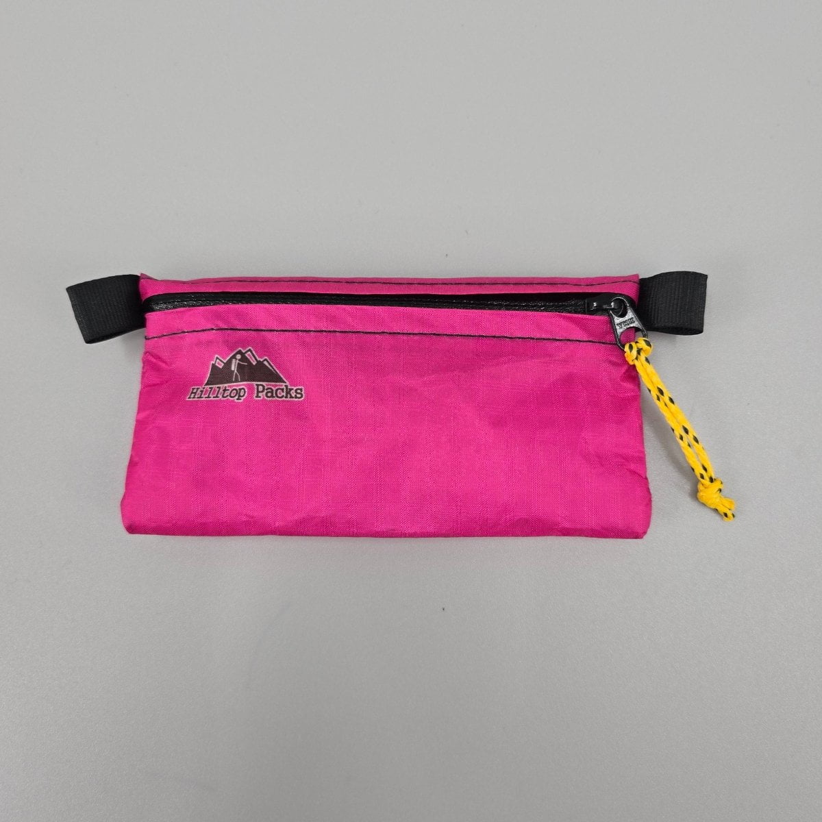 White ultralight zipper pouch organizer with classic pattern from Hilltop Packs LLC, compact and versatile storage solution.