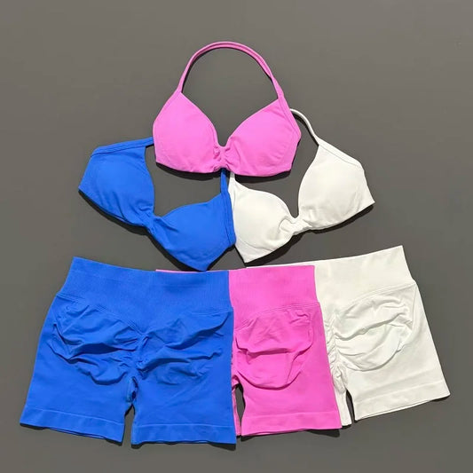 Histello 2-piece women's yoga set with seamless strappy bra and high waist scrunch shorts for workout and fitness activities.