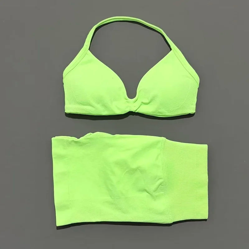 Histello Women's 2-piece yoga gym set with seamless strappy bra and high-waist scrunch shorts for workout and fitness.