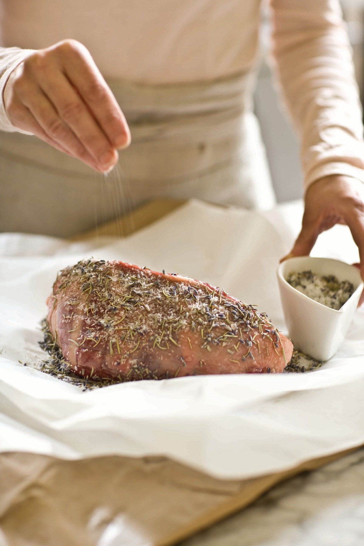 Bella Cucina Wild Oregano & Sage Savory Salt in a spice jar, showcasing the flavorful herb blend for seasoning dishes.