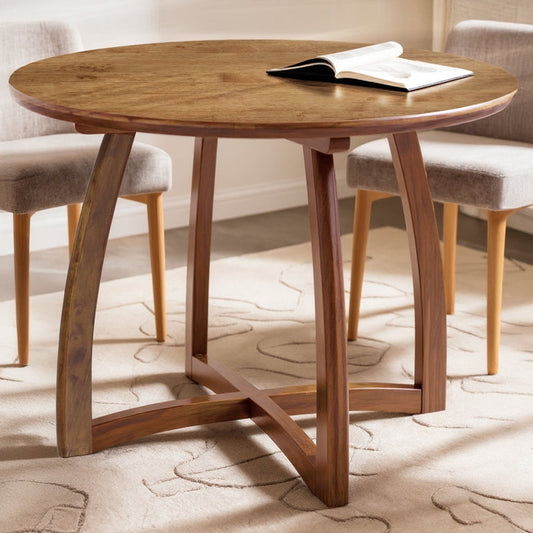 Natural Alma 36-inch round dining table by Megsu, showcasing wooden table with smooth finish and sturdy design.